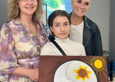 Ukrainian child with selfmade art, Art Therapy at SolNest